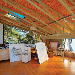 Large country home studio in Los Angeles with plywood floors.