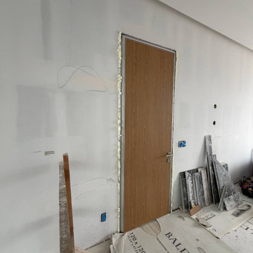 Hidden doors with laminated Walnut