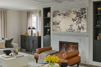 Inspiration for a transitional open concept dark wood floor, brown floor and tray ceiling family room remodel in Toronto with beige walls and a standard fireplace