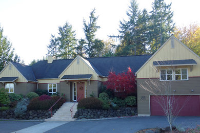 Inspiration for a mid-sized contemporary gray one-story wood exterior home remodel in Seattle