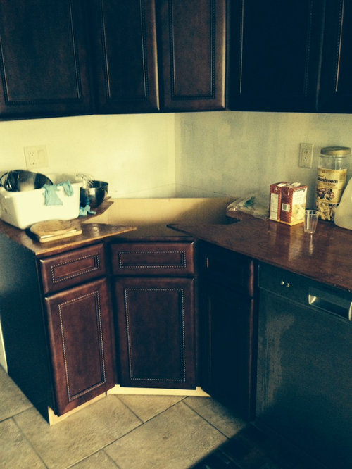 Corner D shaped sink where to put the faucet