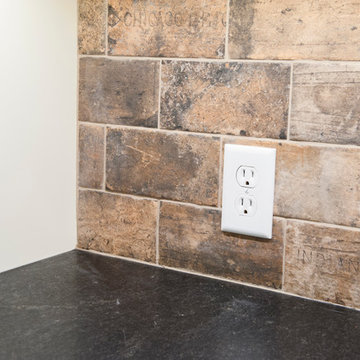 Personalized city stone backsplash with honed granite