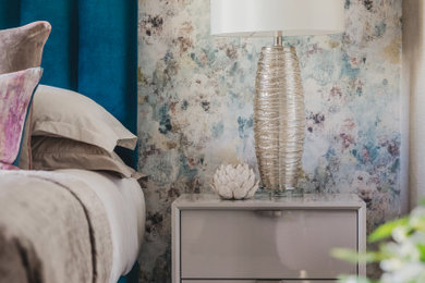 Example of a mid-sized trendy master bedroom design in West Midlands