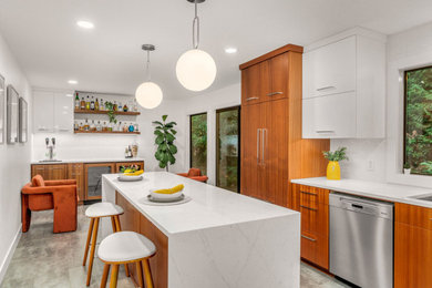 1950s vinyl floor and gray floor kitchen photo in Portland with flat-panel cabinets, medium tone wood cabinets, quartz countertops, white backsplash, mosaic tile backsplash and white countertops