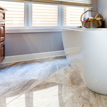 Elegant Master Bathroom Remodel with Quartz-Granite Hybrid Vanity and Spa Shower