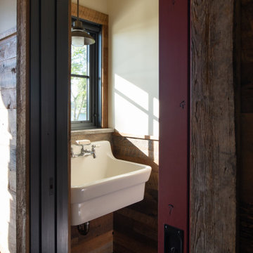 Reclaimed Wood Paneling and Trim in Rustic Powder Room