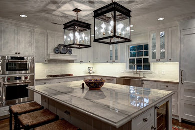 Example of a classic kitchen design in Other