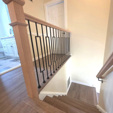 Indoor Railing Installation with Red Oak T-Rail, Box Newels & Black Window Balus