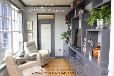 Mid-sized transitional master light wood floor bedroom photo in Atlanta with gray walls