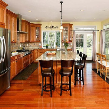 Large Kitchen Addition Opens to Patio for Enhanced Family Living