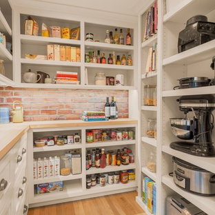 Transitional kitchen pantry ideas - Transitional u-shaped light wood floor and beige floor kitchen pantry photo in Seattle with open cabinets, white cabinets, brick backsplash and no island
