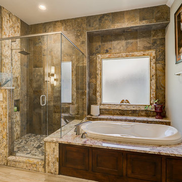 Warm Master Bathroom With Hints of the Outdoors