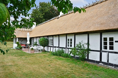 This is an example of a country home design in Other.