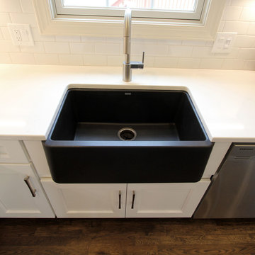 White Kitchen with Gray and Black Quartz Countertop and Bar Area ~ Streetsboro