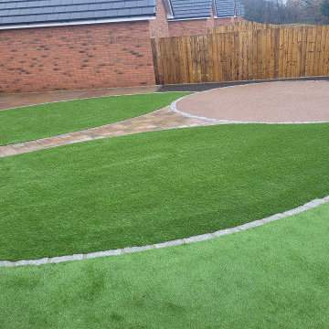 Raj Green Sandstone Patio and Artificial Grass