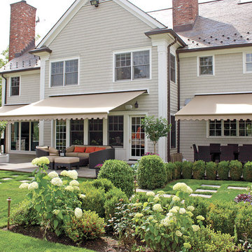 Triple the shade! Series G150 Retractable Awnings in backyard