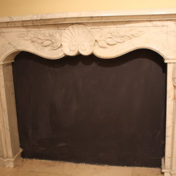 Custom Hand Carved Fireplace - Indoor Fireplaces