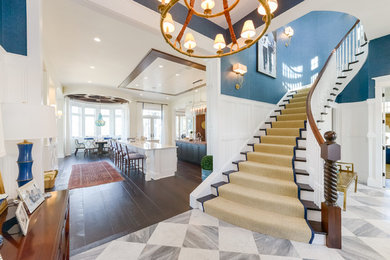 Beach style staircase photo in Other