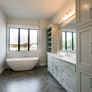 Luxury Master Bath: Herringbone Tile & Custom Vanity