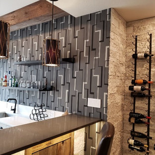 Design ideas for a large eclectic u-shaped seated home bar in Other with an undermount sink, shaker cabinets, white cabinets, quartz benchtops, multi-coloured splashback, light hardwood floors, grey floor and grey benchtop.