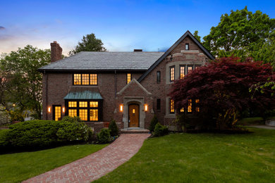 Example of a french country exterior home design in Boston