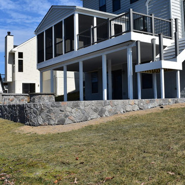 Stamped Concrete with Stone fire pit and stone wall