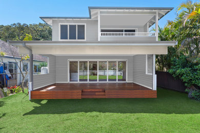 Photo of a beach style home design in Sydney.