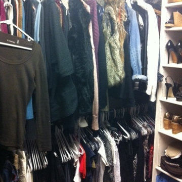 Large Women's walkin closet before