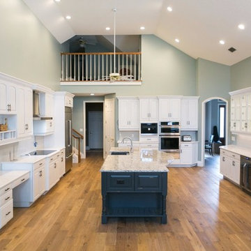 Painted Cabinets, Large Center Island and Mixed Countertops