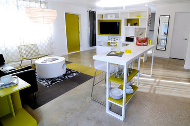 Small modern kitchen/dining combo in Other with white walls and concrete floors.
