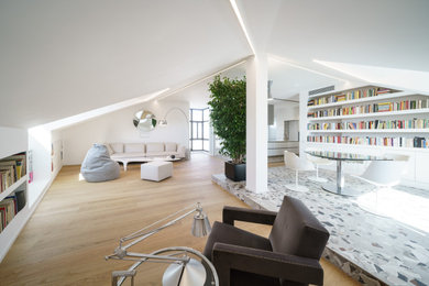 This is an example of an expansive contemporary living room in Rome.