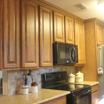 Tawny Oak Cabinets w/Chocolate Truffle Caesarstone and Subway Backsplash