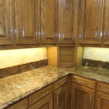 Coliseum kitchen with custom granite sink and Ogee edge