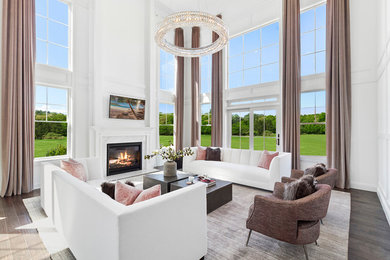Example of a large trendy formal and open concept medium tone wood floor and brown floor living room design in New York with white walls, a standard fireplace and a wall-mounted tv