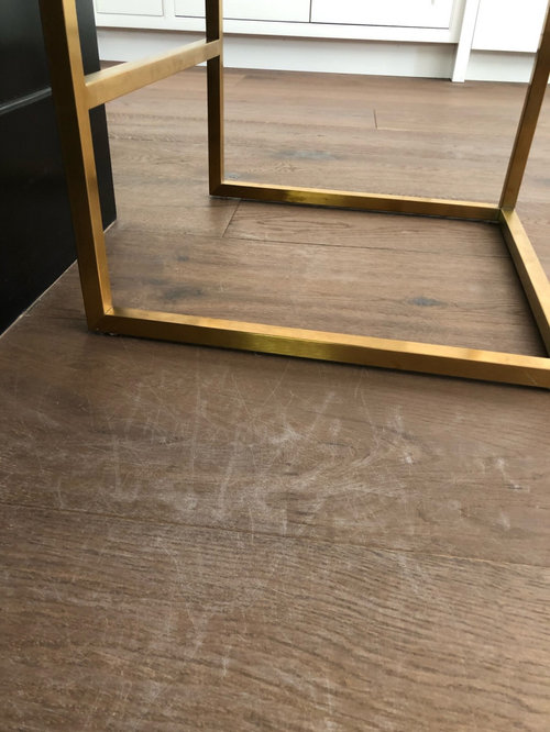 Help! My bar stools are ruining my wood floors!