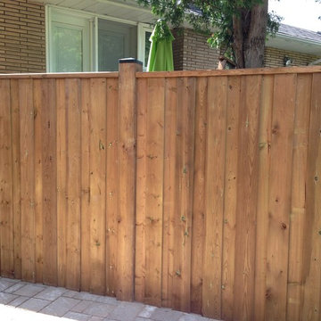 Backyard Interlock Paver Patio with setp down, New Wooden Fence with custom gate