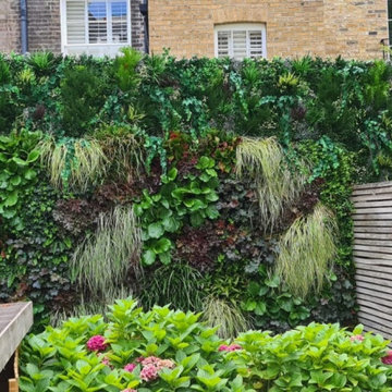 Custom Green Wall with Fake Green Foliage