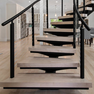 Curved Floating Stairs with Maple Treads