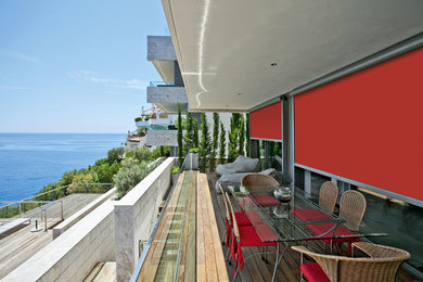 Inspiration for a small contemporary balcony in Newcastle - Maitland with an awning.