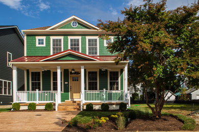 Inspiration for a large contemporary green two-story concrete fiberboard exterior home remodel in Baltimore