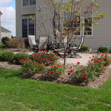Formal paver patio gardens