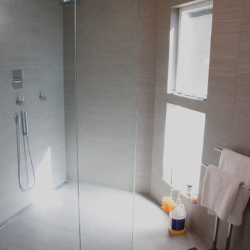 Double shower with linear drain