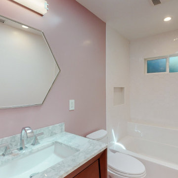 pink full bathroom remodel with mosaic tile