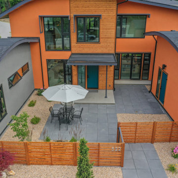 Custom solar shade eyebrows over exterior windows