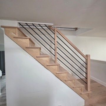 Horizontal Stair Railing with Red Oak T-Rail and Black Metal Bars