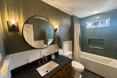 Inspiration for a small 1960s kids' bathroom remodel in Philadelphia with beaded inset cabinets, medium tone wood cabinets and a freestanding vanity