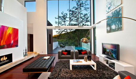 8 salons sublimés par une hauteur sous plafond exceptionnelle