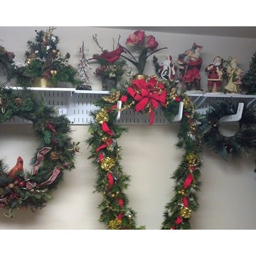 Store and organize holiday decorations on Wall Control pegboard tool board panel