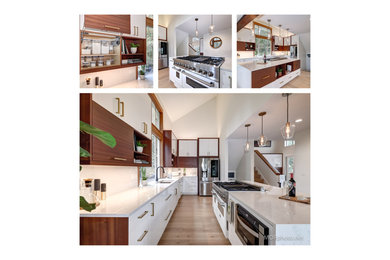 Inspiration for a large modern l-shaped light wood floor eat-in kitchen remodel in Portland with an undermount sink, flat-panel cabinets, dark wood cabinets, quartz countertops, white backsplash, quartz backsplash, stainless steel appliances, an island and white countertops