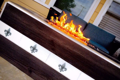 Mid-sized trendy stone patio photo in Phoenix with a fire pit